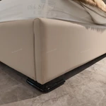 Diamond-Tufted Leather Bed with Curved High-Gloss Wood Side Borders